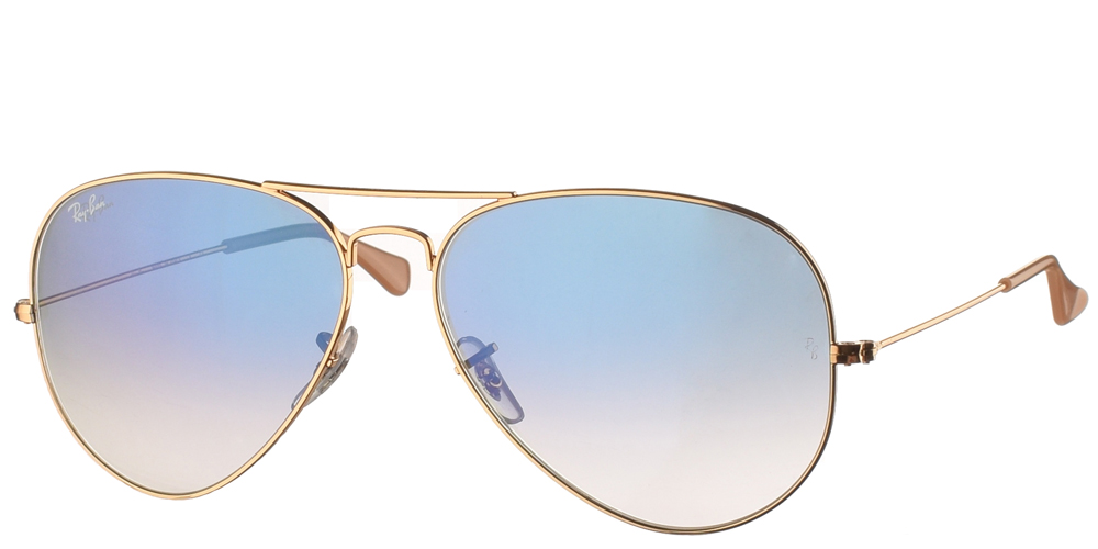 Διαχρονικά aviator γυαλιά ηλίου RB 3025 σε χρυσό μεταλλικό σκελετό και μπλε ντεγκραντέ κρυστάλλους της εταιρίας Ray Ban για μεσαία και μεγάλα πρόσωπα.